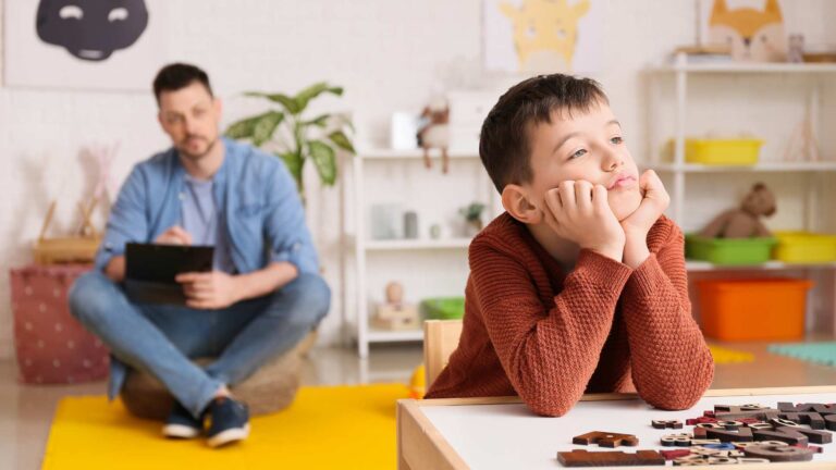 Therapist evaluating co-occurring conditions in autism